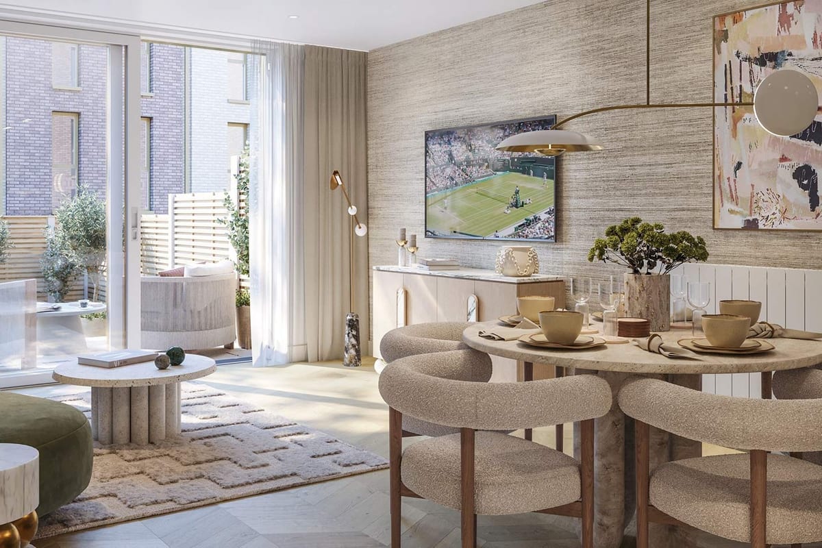Computer-generated image of a townhouse living and dining area: a round dining table with curved upholstered chairs, a green sofa and glass doors to the garden